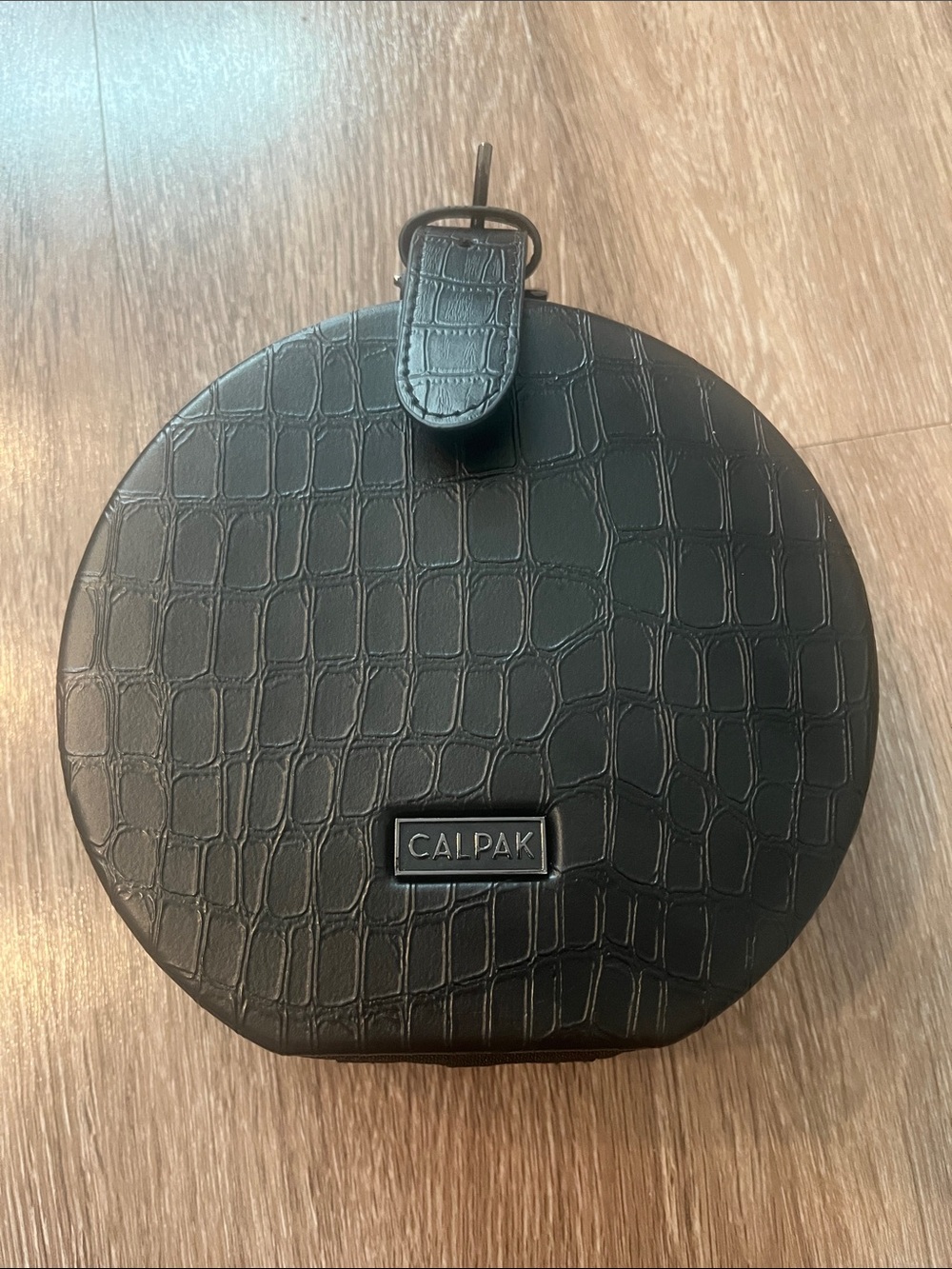 Calpak Black Croc-Embossed Round Bag